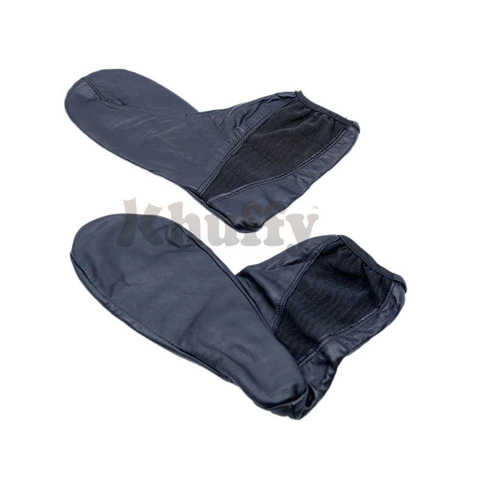 Black leather khuff socks for wudu and Islamic ablution, shown on a mannequin foot.
