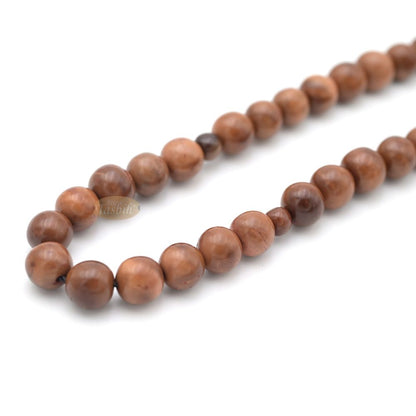 Natural Kuka 8 mm Palm Seed Tasbih – 33-bead with Brown Yarn Stops