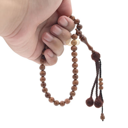 Natural Kuka 8 mm Palm Seed Tasbih – 33-bead with Brown Yarn Stops