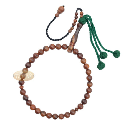 Natural Kuka 8 mm Palm Seed Tasbih – 33-bead with Green Yarn Stops