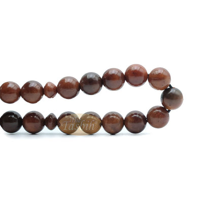 Natural Kuka 8 mm Palm Seed Tasbih – 33-bead with Green Yarn Stops