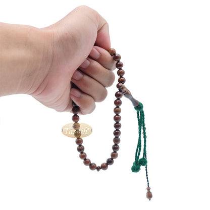 Natural Kuka 8 mm Palm Seed Tasbih – 33-bead with Green Yarn Stops