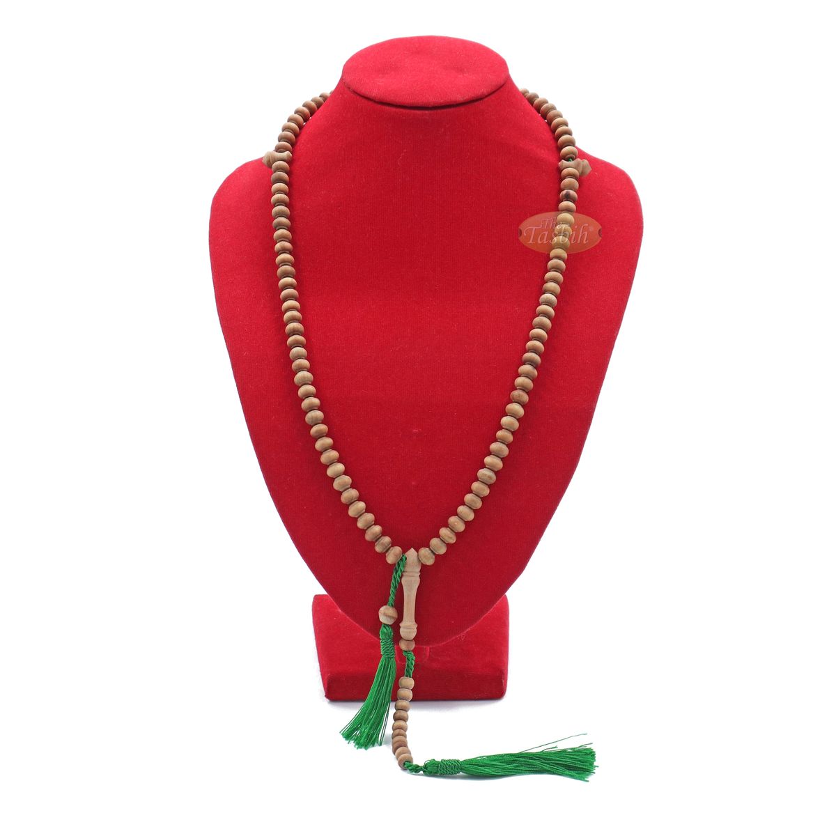 Wooden Islamic misbaha prayer beads with green tassels.
