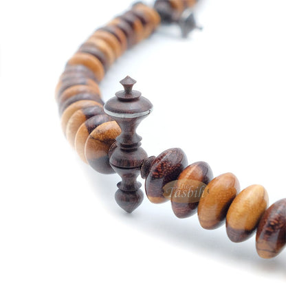 Wooden Tijani Tasbih | Limited Edition Ain Madhi Mixed Tone Tamarind Wood 12×6 mm Saucer Pewter Inlay 100-Bead Misbaha
